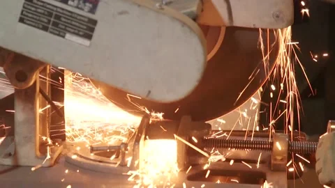 Working man cuts metal square pipes on the machine. Stock-Footage 175422464