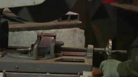 Working man cuts metal square pipes on the machine. 스톡 동영상 175422466