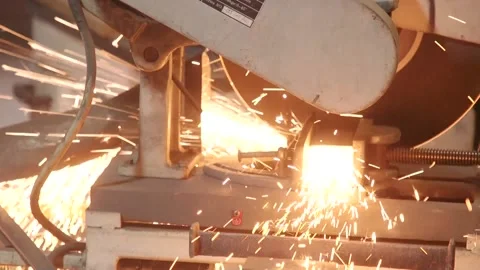 Working man cuts metal square pipes on the machine. Stock Footage 175422501