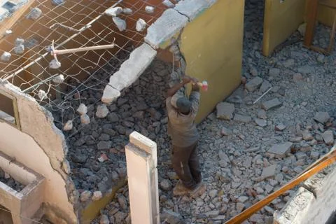 Working man with a hammer Stock Photos
