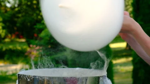 Working man making cotton candy during holiday festival Stock-Footage 111420700
