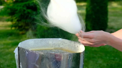 Working man making cotton candy during holiday festival Stock-Footage 111420909