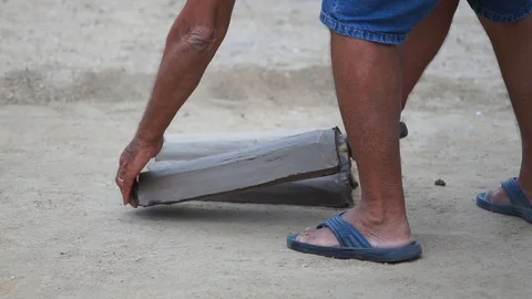 Working man making traditional clay tiles close up Stock Footage 117362453