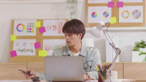 Working man typing on laptop while sitting at desk in modern living room befo Video stock 172253861