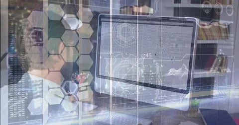 Working man wearing jacket viewing code on desktop monitor in office, with HU Stock Photos