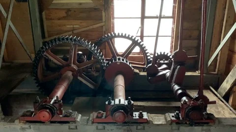 Working mechanical internal movement of water wheel including cogs and rods. Stock Footage 121580766