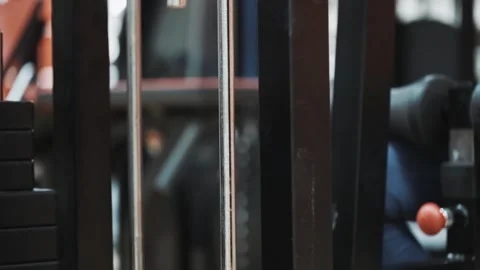 Working mechanism of weight stack in a gym trainer machine Stock Footage 152696213