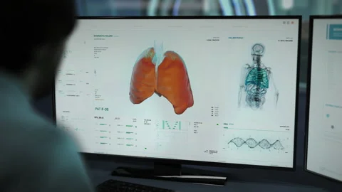 Working In Medical Diagnostics Software At Clinic To Identify Covid-19 Virus Video stock 156755100