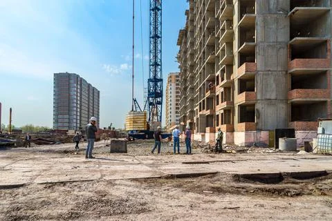 Working meeting at the construction site to solution pressing issues Stock Photos