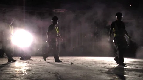Working men, backlit in construction site. Stock Footage 49861482
