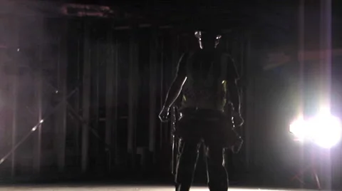 Working men, backlit in construction site. Stock Footage 49861512