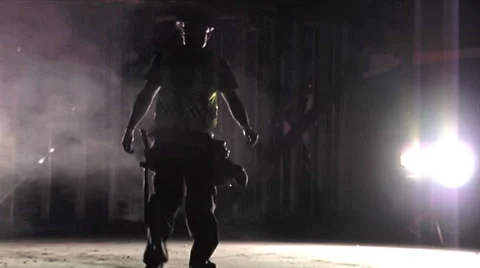 Working men, backlit in construction site. Video stock 49861516