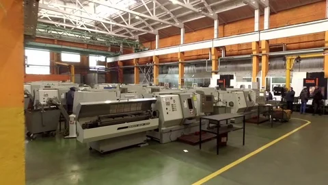 Working men in a computer-integrated factory Stock Footage 71024016