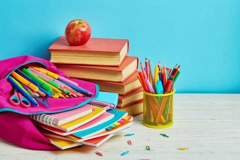 Working mess on the table in the student Stock Photos