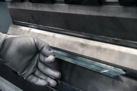 Working on metal part Stock Photos