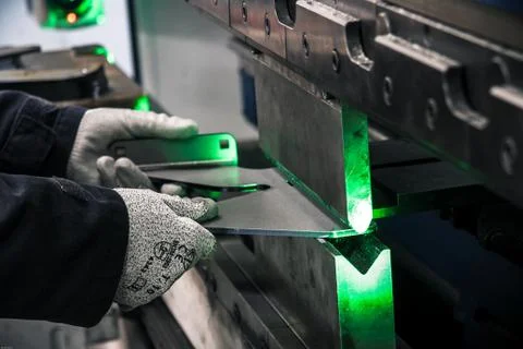 Working on metal part Stock Photos