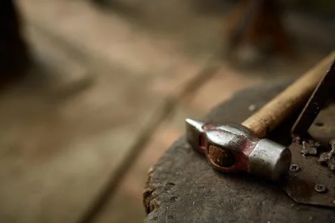 Working metal tools in blacksmith's workshop, close-up, selective focus, nobody Stock Photos