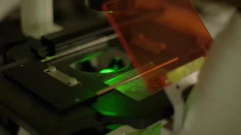 Working with microscope Stock Footage 70928534