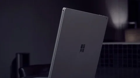 Working on a Microsoft Surface (laptop or tablet) Stock Footage