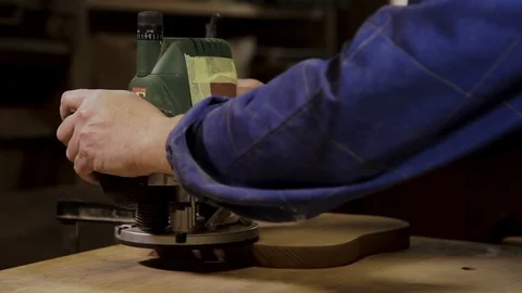Working with milling machine in carpentry workshop Stock Footage 100825502