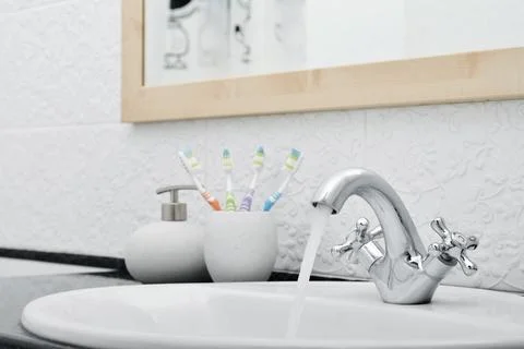 Working mixer tap Stock Photos