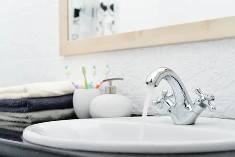 Working mixer tap Stock Photos