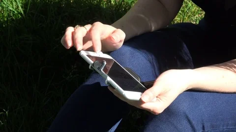 Working with mobile applications on a white smartphone Stock Footage 79605968