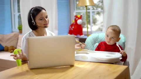 Working mom having online video call Stock Video Pond5