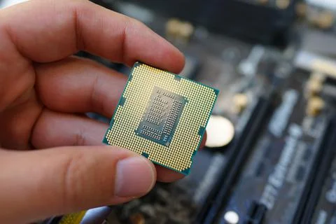 Working on motherboard and pc processor and memory Stock-Fotos