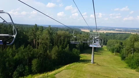 Working mountain cableway in summer sunny day Stock Footage 194452200