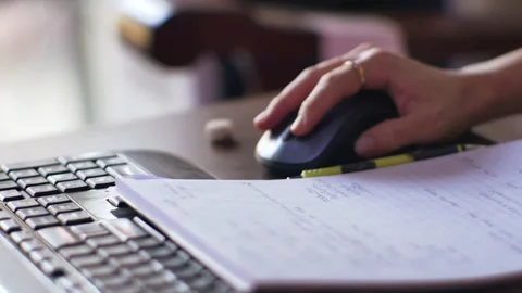 Working with mouse and keyboard Stock Footage 196616574