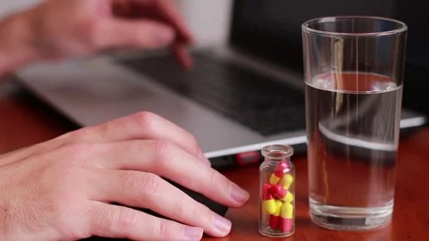 Working with mouse and taking medicine Stock-Footage 81057738