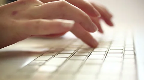 Working on netbook HD dolly 1080i Stock Footage 34345403