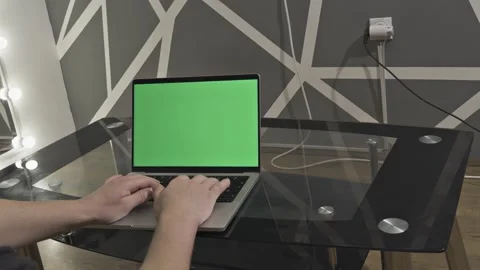 Working on notebook - green screen Stock Footage 311085436