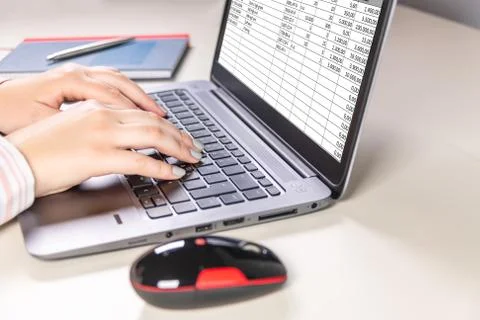 Working at notebook keyboard Foto stock