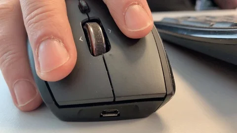 Working in the office with a computer mouse close-up Stock Footage 108535162