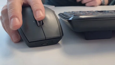 Working in the office with a computer mouse Stock Footage 108534909