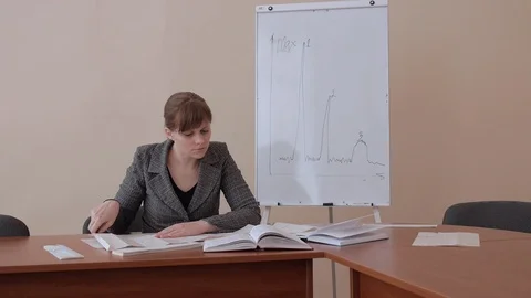 Working in office with documents and business graphs. Stock Footage 73577188