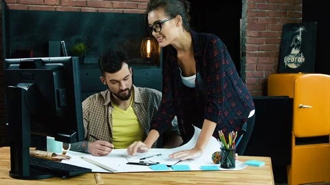 Working in office in pair Stock Footage 92121069