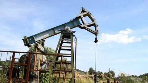 Working oil pump on the blue sky Stock-Footage 56746466