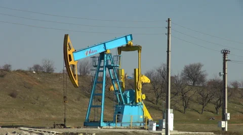 Working oil pumpjack, donkey pumper, oil well pump,  fuel drilling, crude oil Stock Footage 36241019