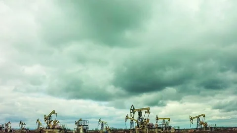 Working Oil Pumps at blue sky time lapse Stock Footage 74647983