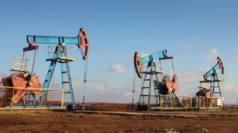 Working oil pumps in a row Stock Footage