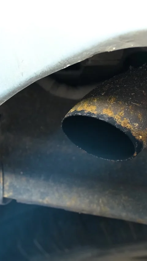Working Old Car Exhaust Vertical Video Stock Footage 334872098