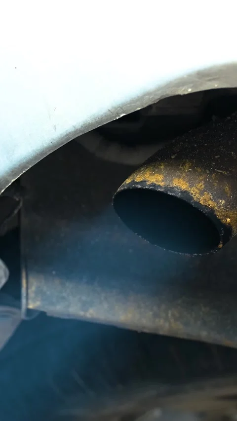 Working Old Car Exhaust Vertical Video Stock Footage 334883512