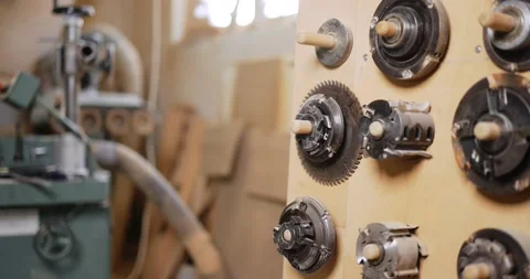Working on the old grinding machine at the carpentry Stock Footage 147398172