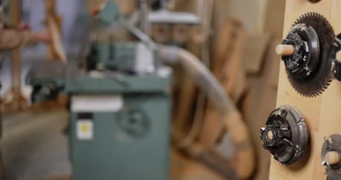 Working on the old grinding machine at the carpentry Stock Footage 147398358