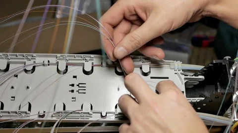 Working with an optical fiber coupler Stock Footage 73820325