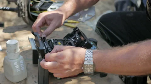 Working with an optical fiber coupler Stock Footage 112200513