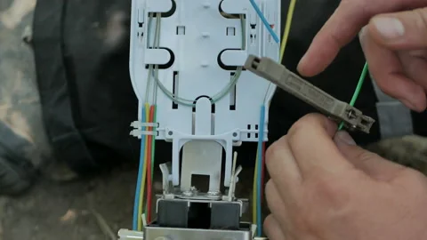 Working with optical fiber Stock Footage 112245761